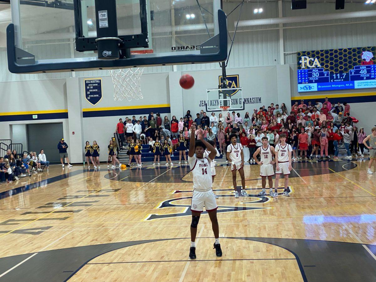 Miller scores 21, helps USN advance to district final