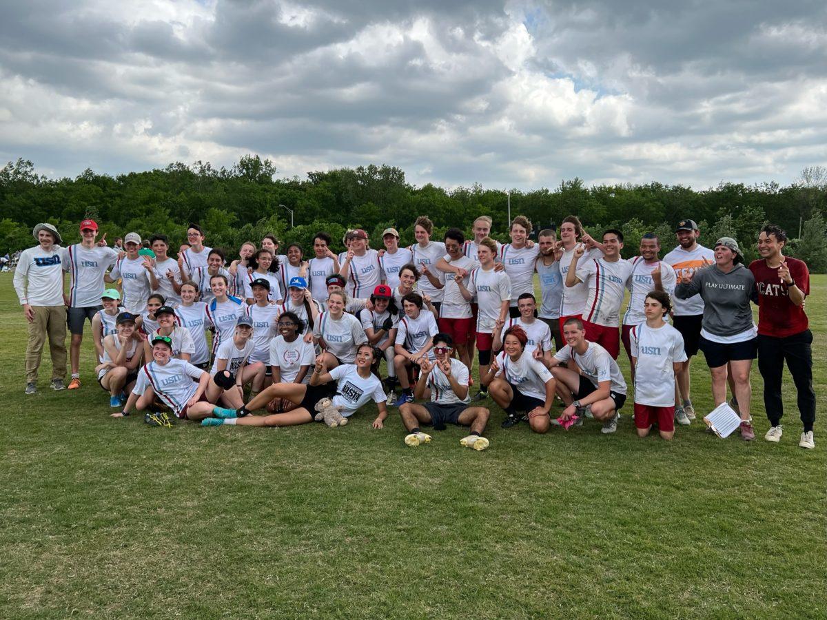 Both USN frisbee teams celebrate after a double state championship win.