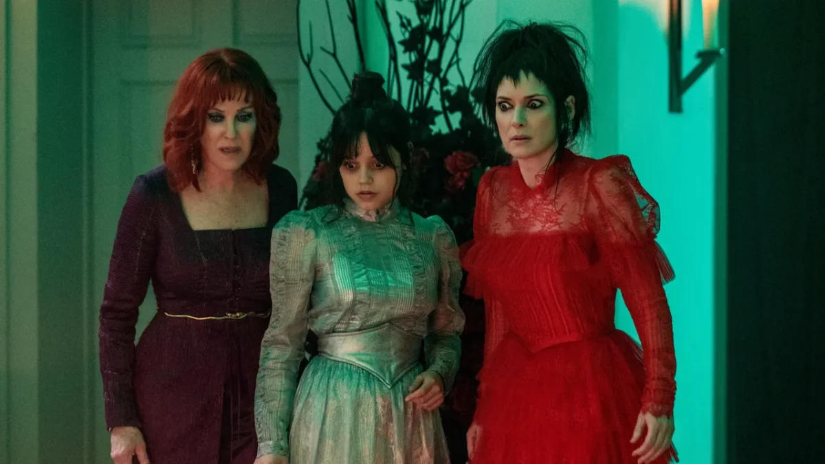 Three Generations of Deetz’s: From left to right, Delia, Astrid, and Lydia Deetz look upon the sandworm with horror (via Warner Bros. Pictures)
