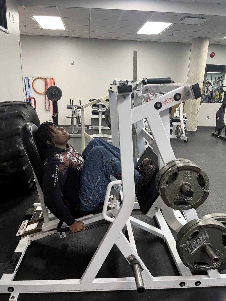 Left: Mayfield powers through a leg press session at the Fitness Center. (via the Peabody Press)