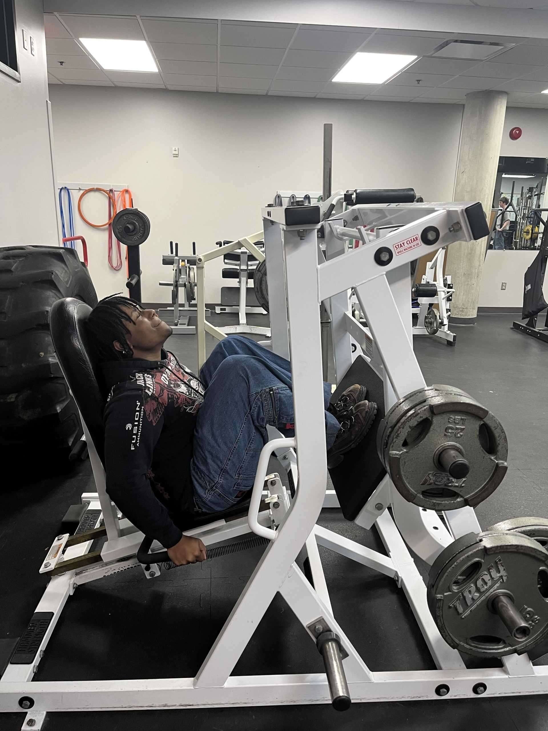 Left: Mayfield powers through a leg press session at the Fitness Center. (via the Peabody Press)