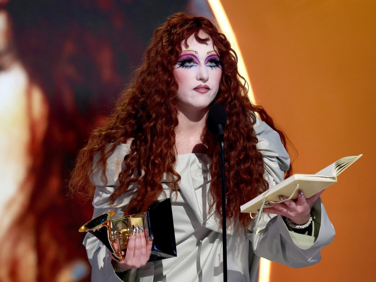 Chappell Roan reads from her journal during her acceptance speech. (Getty Images)