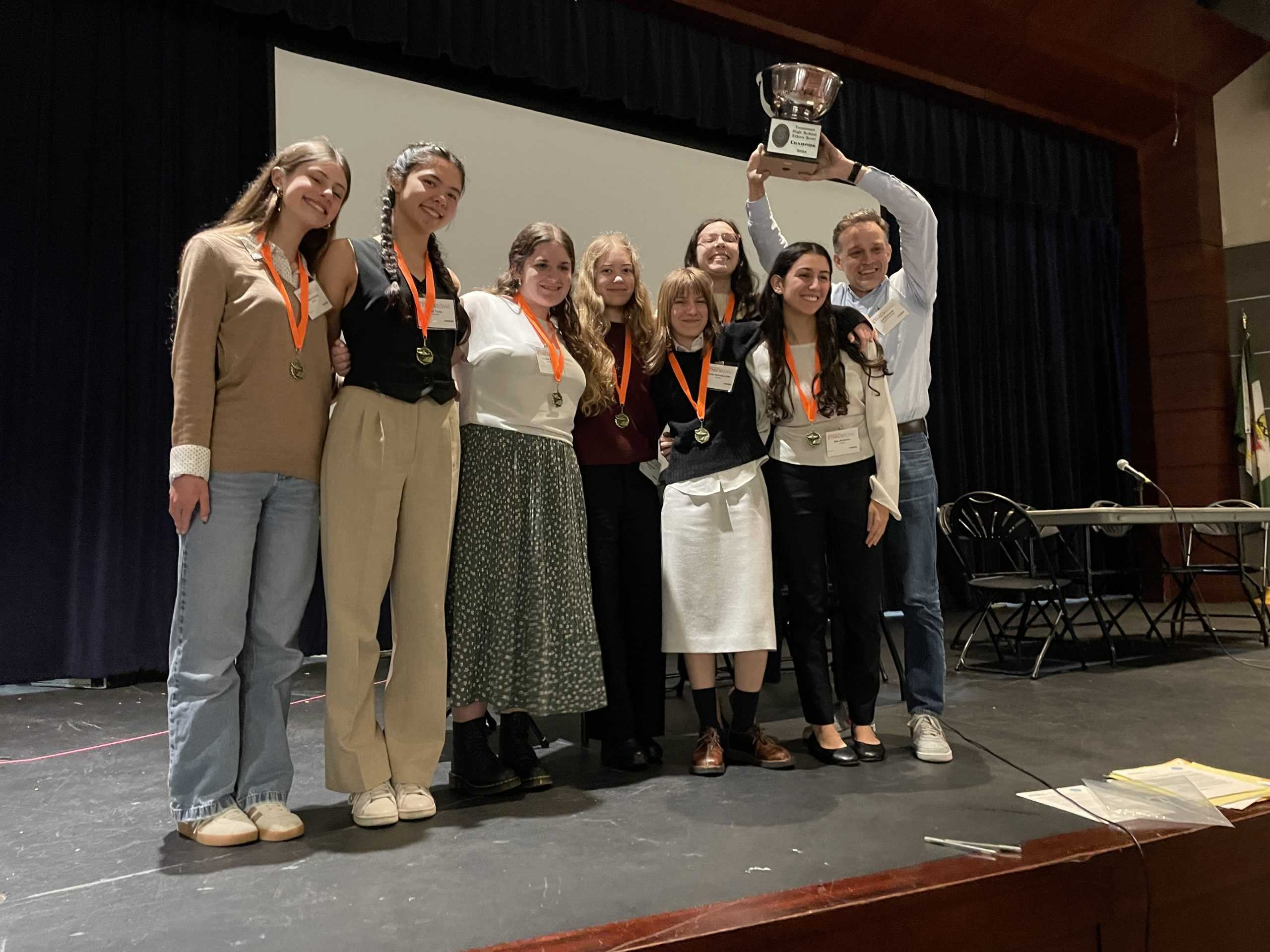 Ethics Bowl’s A team holding the coveted “Ethics Bowl” after winning the regional championship.  (Photo provided)Ethics Bowl’s A team holding the coveted “Ethics Bowl” after winning the regional championship.  (Photo provided)
