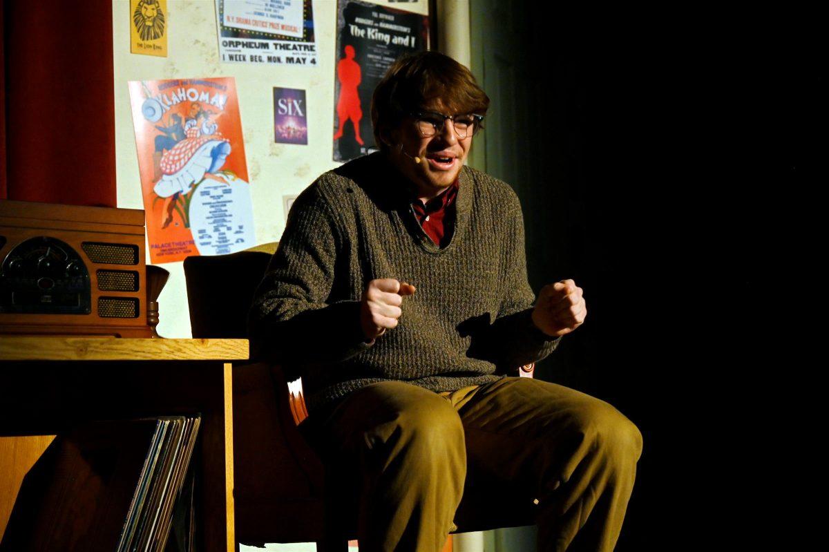 Henry Gatto ‘25 as the “Man in the Chair” during his 2024 performance of The Drowsy Chaperone. (Photo via Rick Malkin)