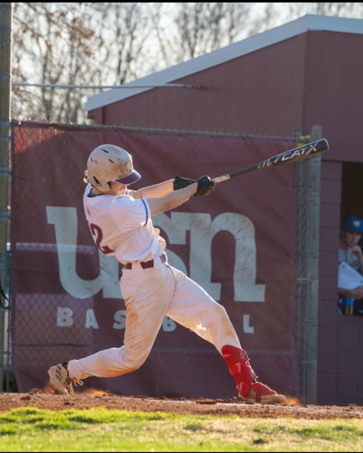 Carson Darr '25 steps up to the plate with a strong swing. (via USN athletics)