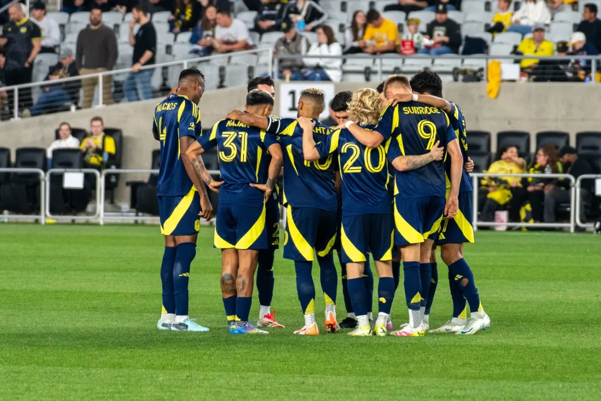 HUDDLE UP: The Boys in Gold discuss the game plan against the Columbus Crew. (via Johel Maza/Six One Five Soccer)