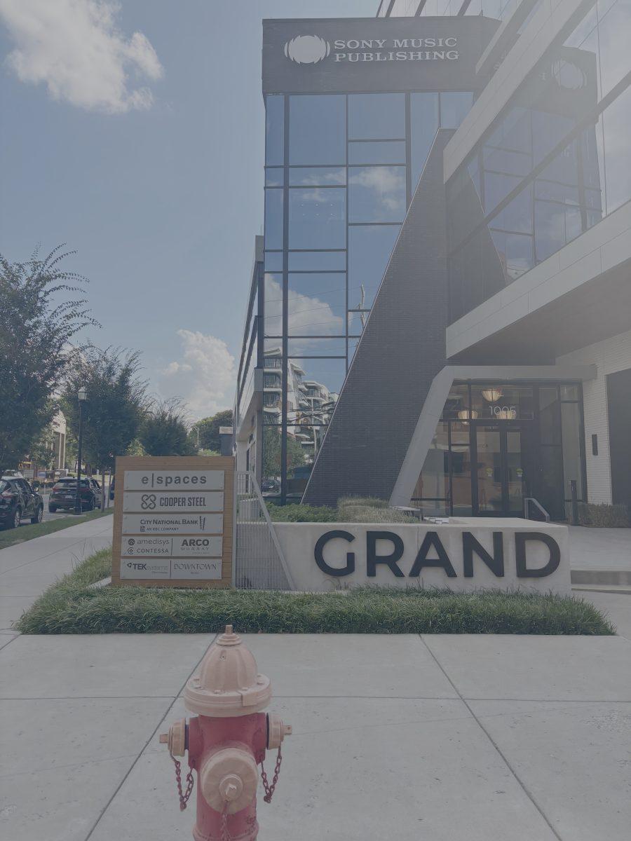 A gleaming glass monolith towers over Music Row. Image via the Peabody Press.
