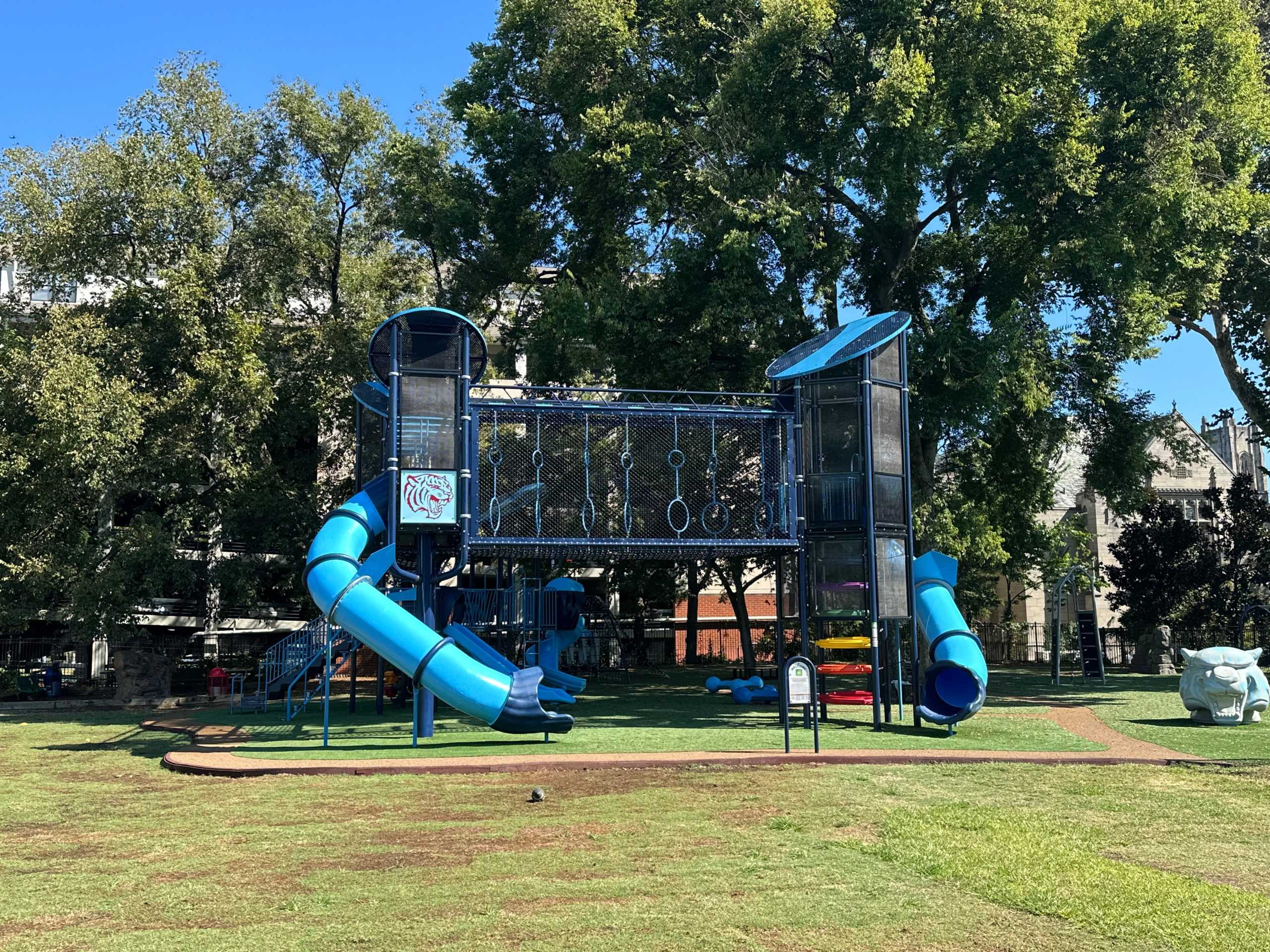 OUT WITH THE OLD, IN WITH THE BLUE: The new blue playground stands in the corner of the back field. (via the Peabody Press)