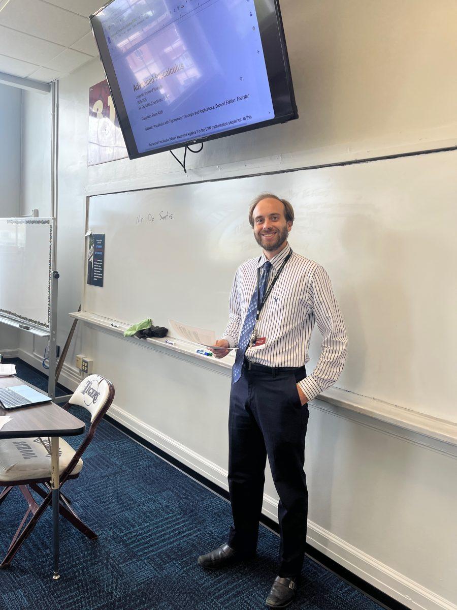 De Santis stands at the front of the room, excited to be teaching! (via Jeff Edmonds)