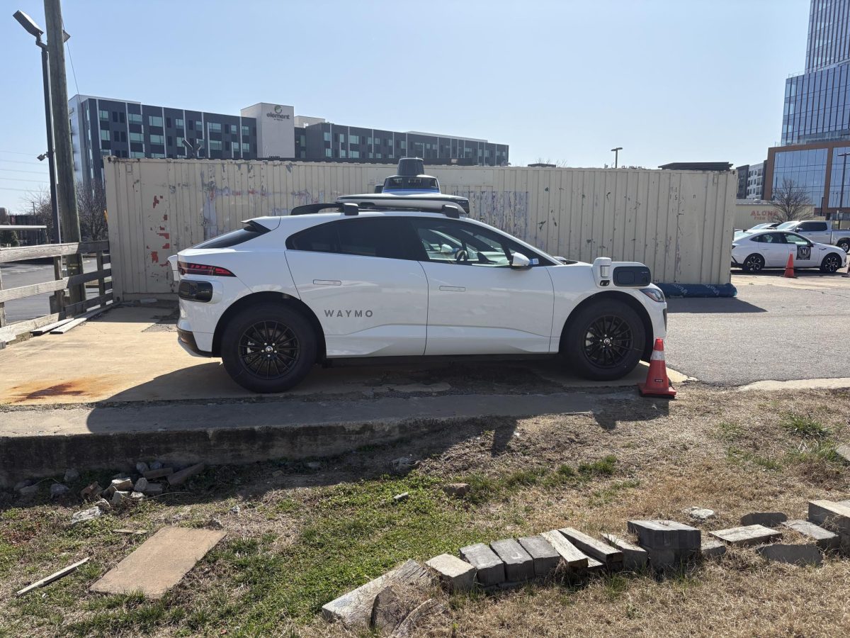A Waymo car outfitted with all of its sensor technology.