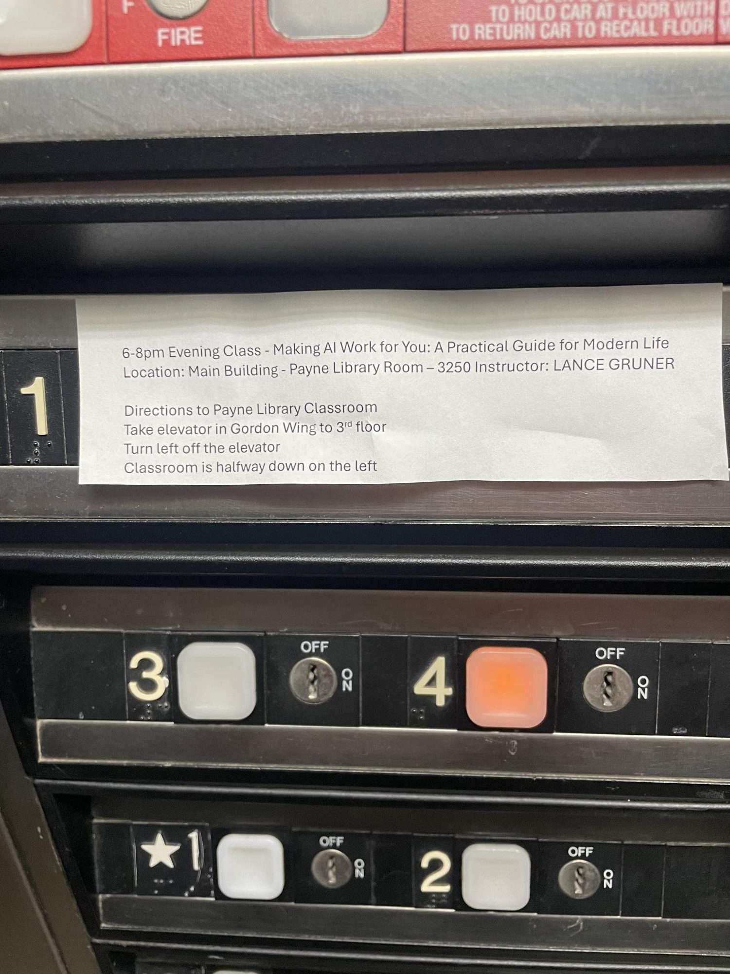 IT'S EVERYWHERE! A sign in the Gordon wing elevator points Evening Class participants to a program about AI. (via the Peabody Press)