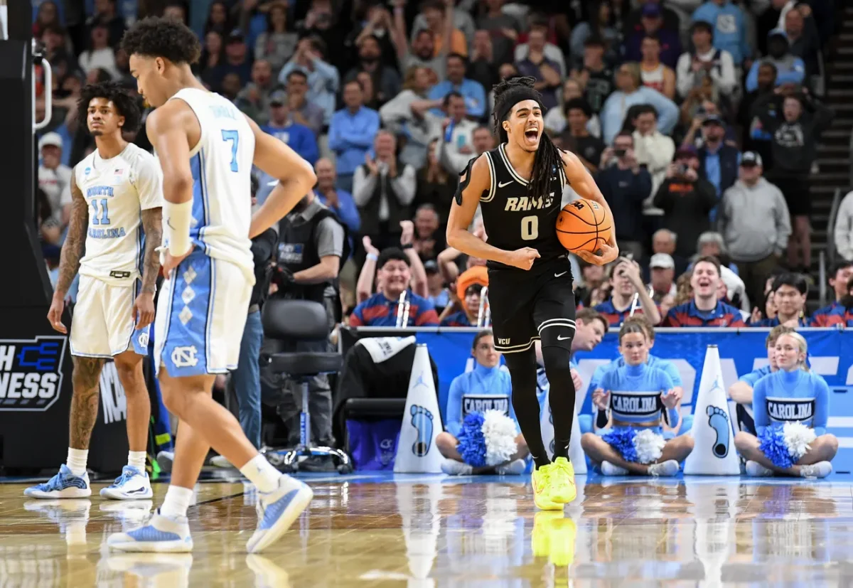 TARHEELS ARE UPSET: VCU Rams guard Brandon Jennings (0) celebrates as the VCU Rams upset 82-78 over the Tarheels. (via Greenville News)