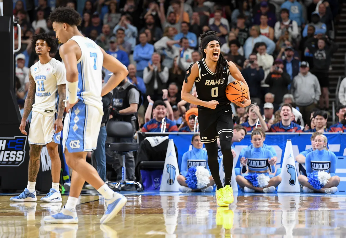TARHEELS ARE UPSET: VCU Rams guard Brandon Jennings (0) celebrates as the VCU Rams upset 82-78 over the Tarheels. (via Greenville News)