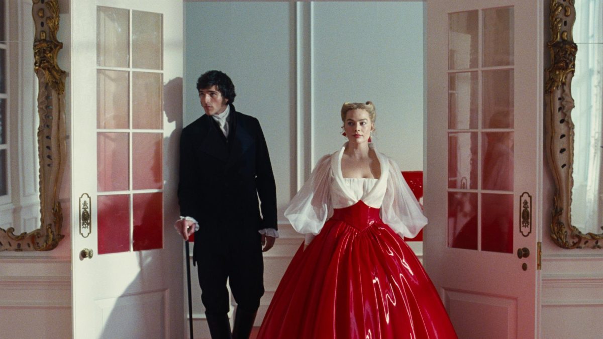 DRAMATIC ENTRANCE: Heathcliff (Jacob Elordi) and Catherine (Margot Robbie) re-enter the Linton Estate after an afternoon out. (via IMDB)
