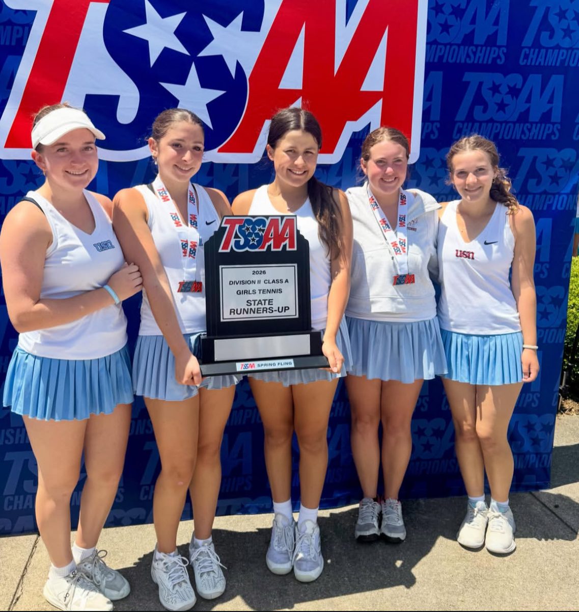 Meredith Kojetin '26, Abbey Adkins '28, CC Cook '29, Sphie Oliver '26, and Mary Kate Adler '28 display their state runner-up team trophy. (via USN athletics)